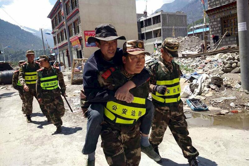 galleries/2015/05/12/second-major-quake-strikes-nepal-photos/150512-nepal-quake-04_vdz63h