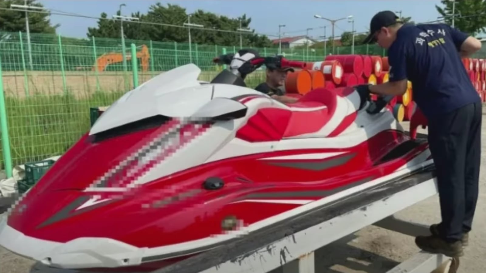 A suspected Chinese dissident was arrested by authorities in South Korea after apparently attempting to flee into the country on a jet ski.
