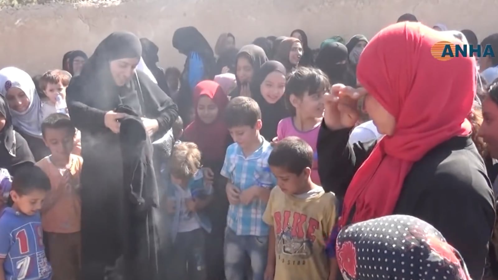 cheats/2016/08/05/video-syrian-women-burn-burqas-to-celebrate-liberation-from-isis/160805-syria-burqa-burn-cheat_fh4tiq