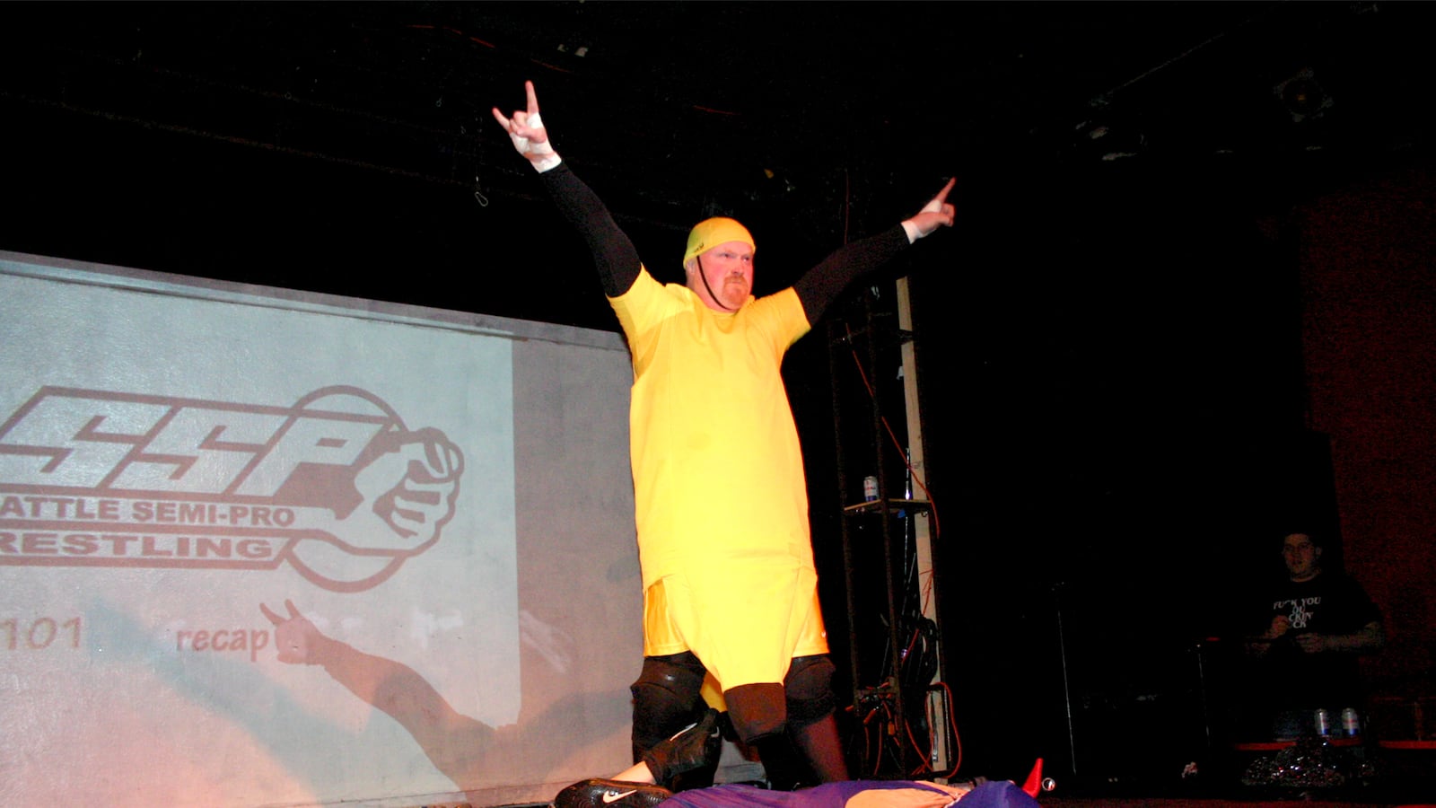 articles/2015/04/18/revenge-of-the-banana-suited-wrestler-the-craziest-wrestling-story-never-told/150418-horstman-bodyslam-banana-tease_ubeqan