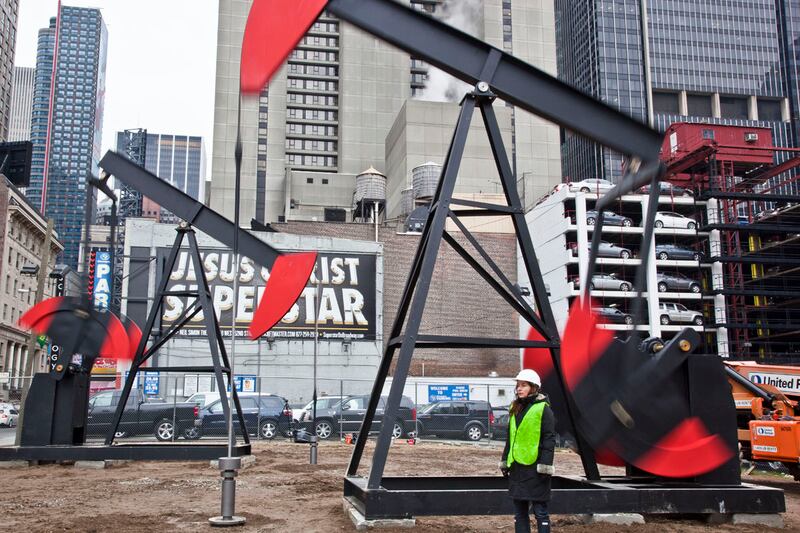 articles/2012/03/06/josephine-meckseper-installs-oil-pumps-near-times/meckseper-oil-gopnik_puxlh4