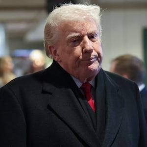 URBANDALE, IOWA - JANUARY 27: U.S. President Donald Trump answers questions from members of the press as he visits the Machine Shed restaurant on January 27, 2026 in Urbandale, Iowa. President Trump is scheduled to speak later at the Horizon Events Center in Clive, Iowa. He returns to Iowa for a second time in his second term ahead of the mid-term elections. (Photo by Win McNamee/Getty Images)