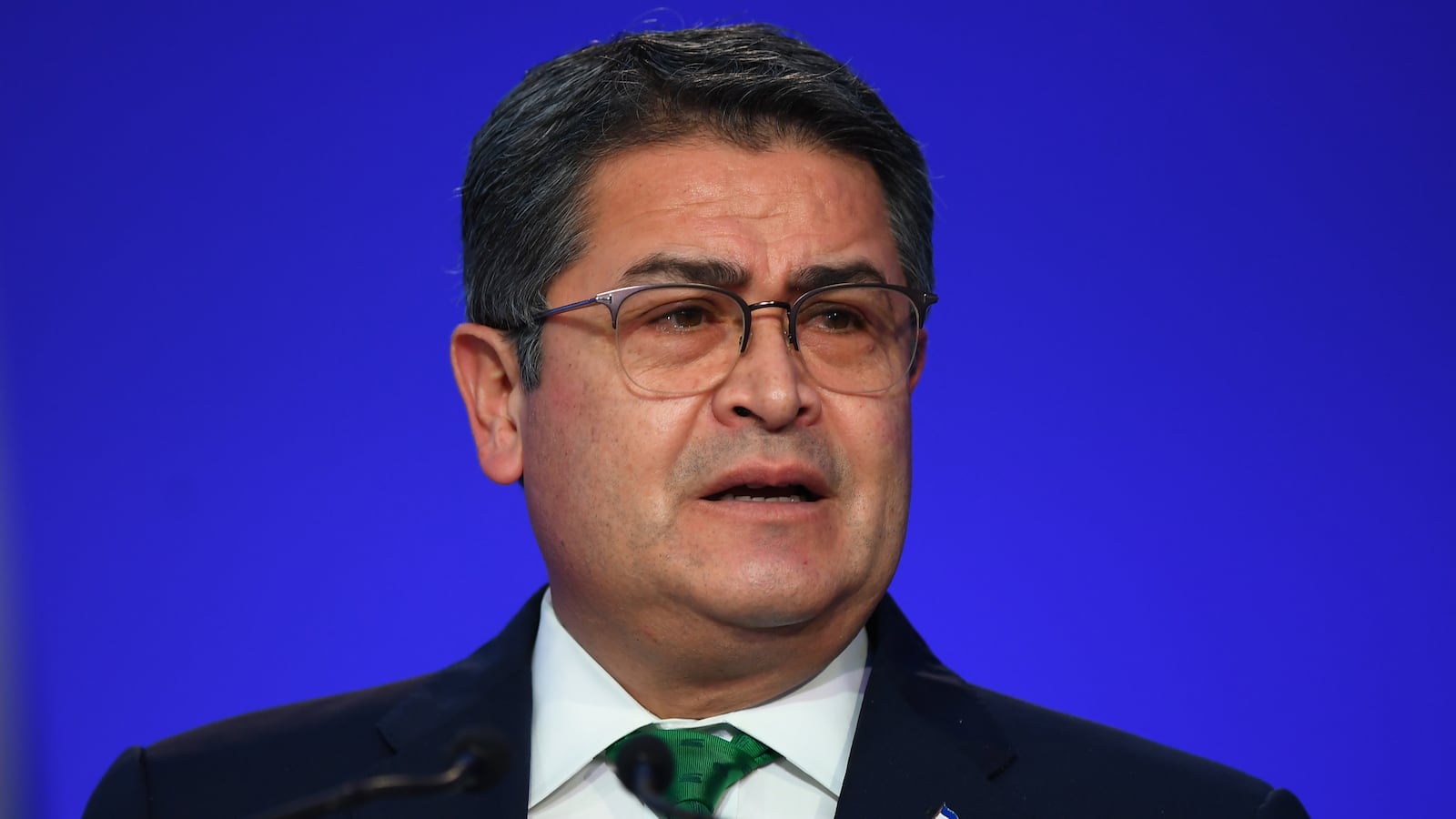 Juan Orlando Hernández presents his national statement during day two of COP26 at SECC on November 1, 2021 in Glasgow, United Kingdom.