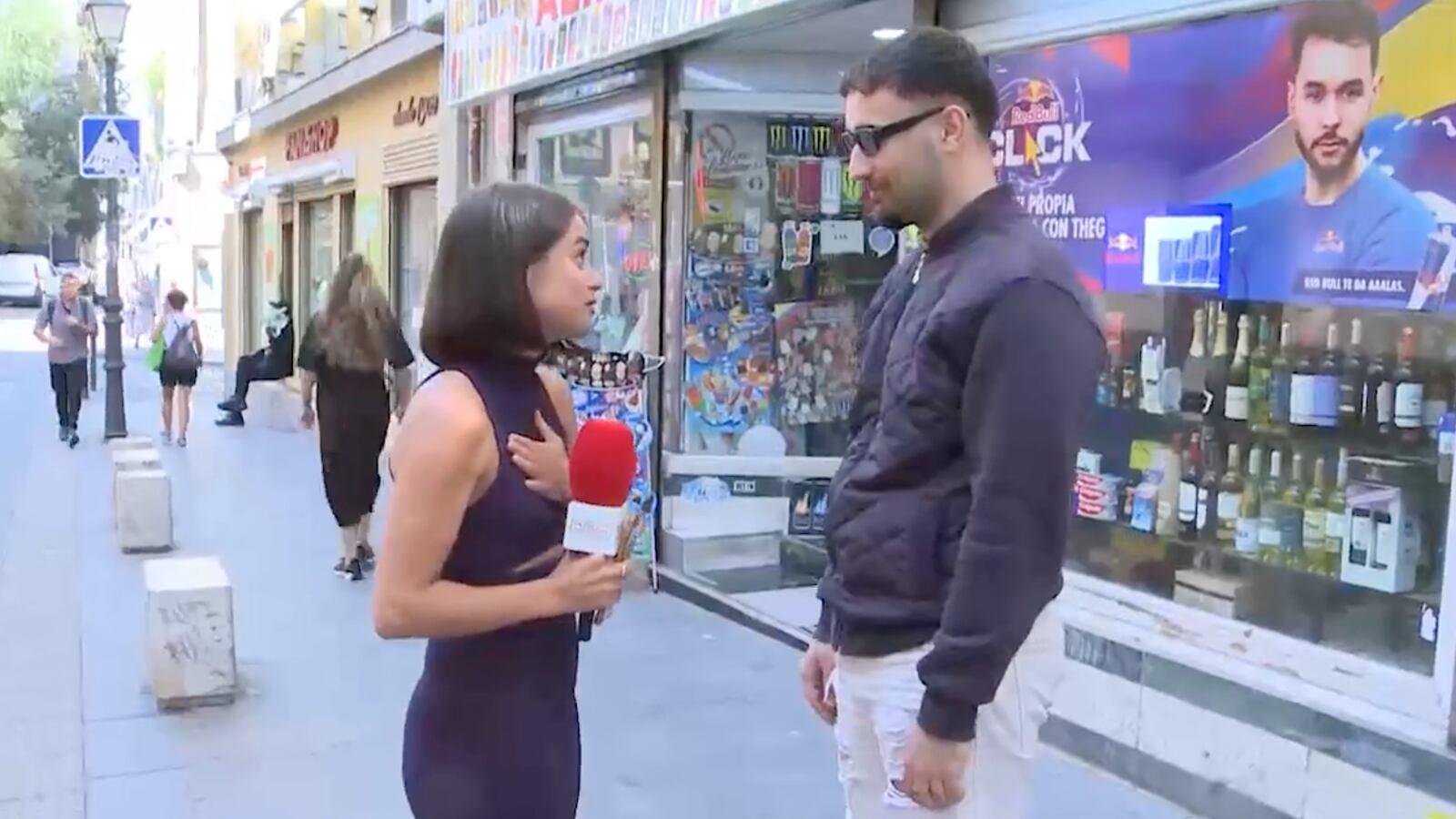 A screenshot of reporter Isa Balada being groped on air.