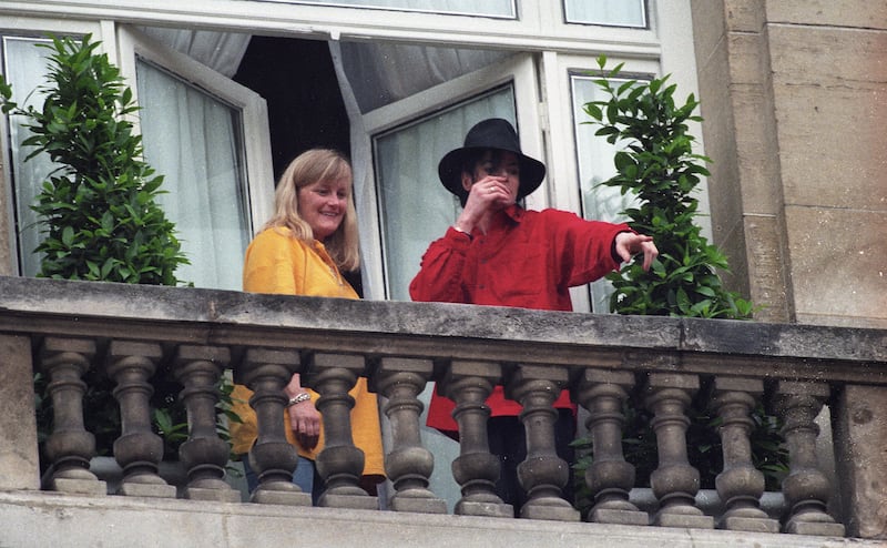 Michael Jackson with Debbie Rowe in 1997 in Paris, France.