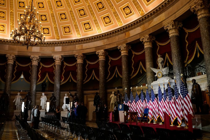 Flags were placed on an event stage in Statuary Hall for the signing ceremony that never came to pass on June 24, thanks to Trump’s last-minute cancellation.