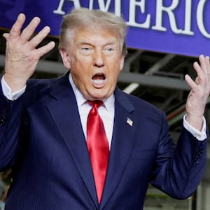 U.S. President Donald Trump delivers remarks during an event at the General Motors Milford Proving Ground in Milford, Michigan, U.S., July 27, 2026.