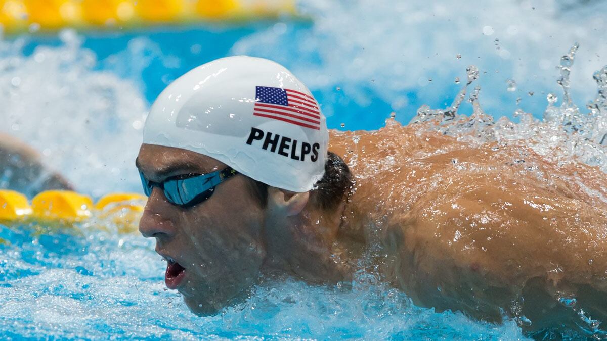 cheats/2012/07/30/michael-phelps-earns-semis-spot/michael-phelps-eyes-gold-olympics-cheat_md1gm3