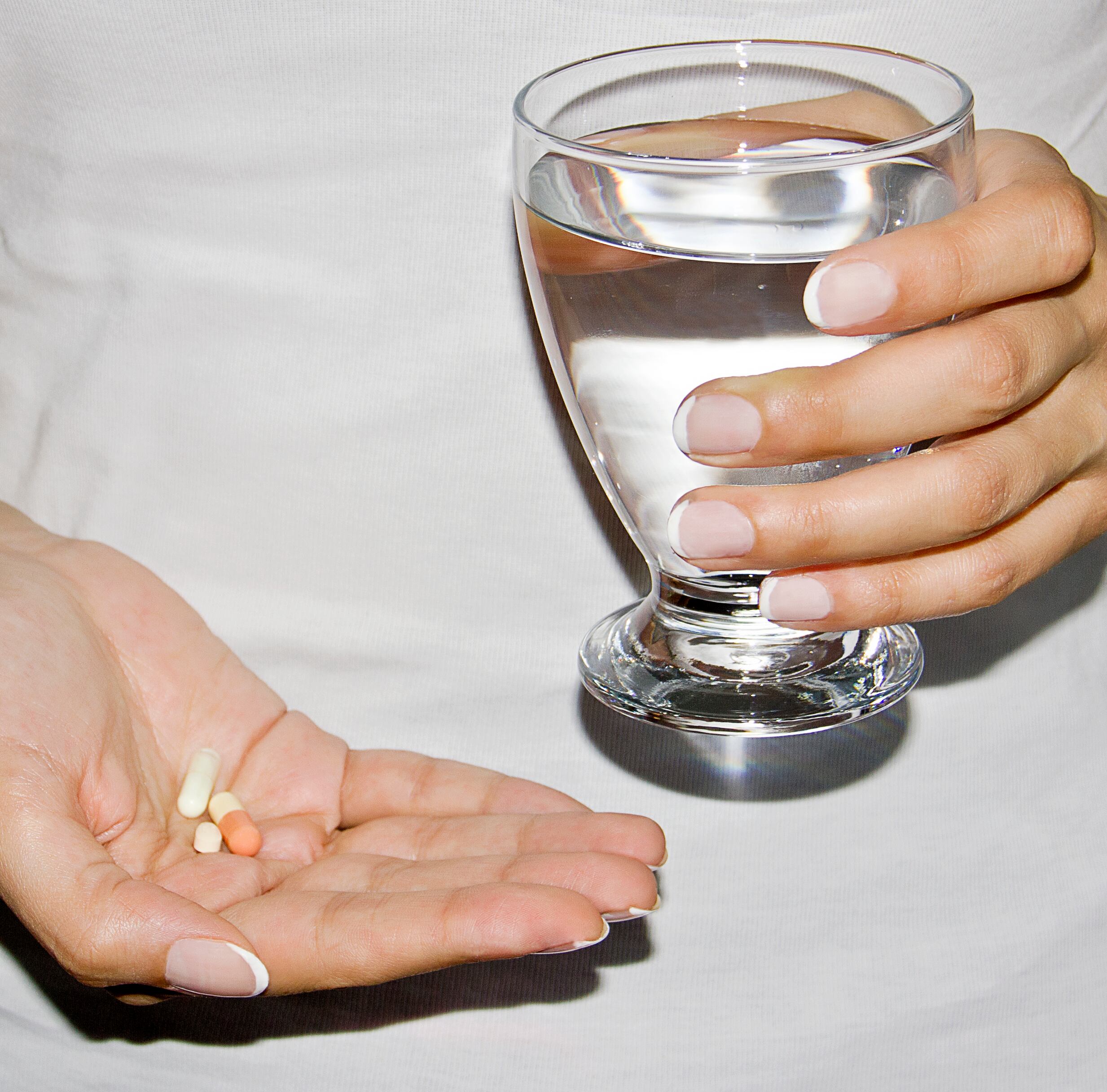 Supplements in a hand