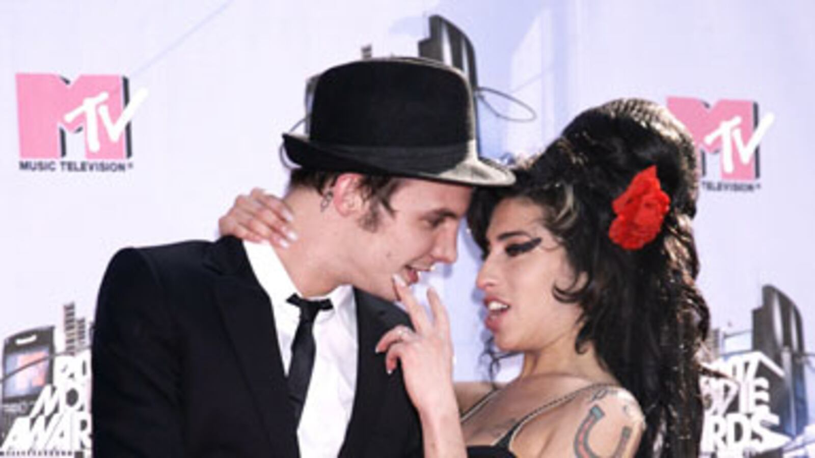 galleries/2009/12/08/will-you-remarry-me/celeb-remarriages---winehousecivil_cnnzph