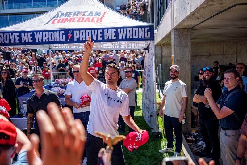 OREM, UTAH - SEPTEMBER 10: Charlie Kirk throws hats to the crowd after arriving at Utah Valley University on September 10, 2025 in Orem, Utah. Kirk, founder of Turning Point USA, was speaking at his "American Comeback Tour" when he was shot in the neck and killed. (Photo by Trent Nelson/The Salt Lake Tribune/Getty Images)