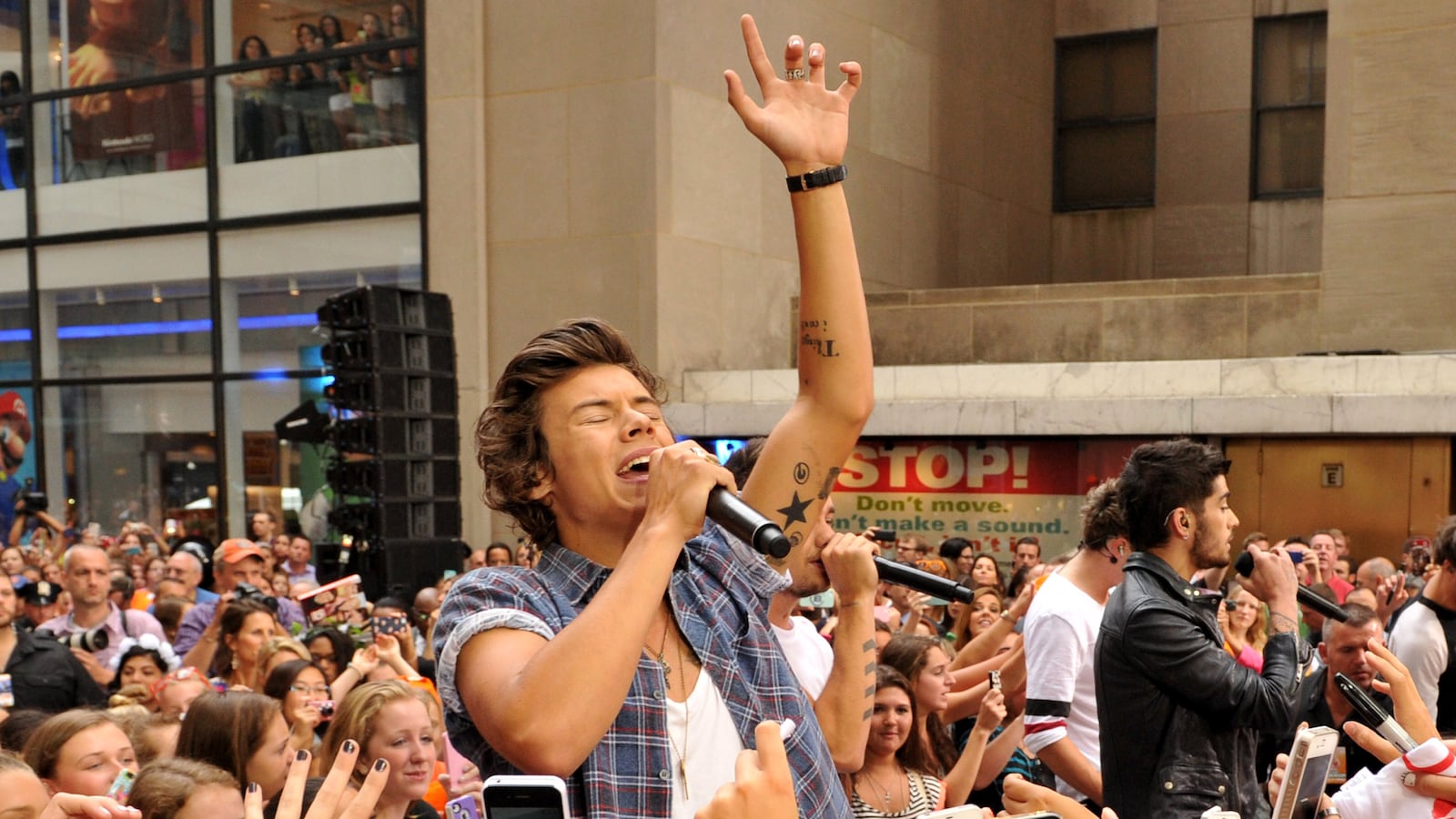 articles/2013/08/28/one-direction-is-a-boy-band-that-proves-you-can-be-both-famous-and-unknown/130827-one-direction-guide-tease_xgfz8f