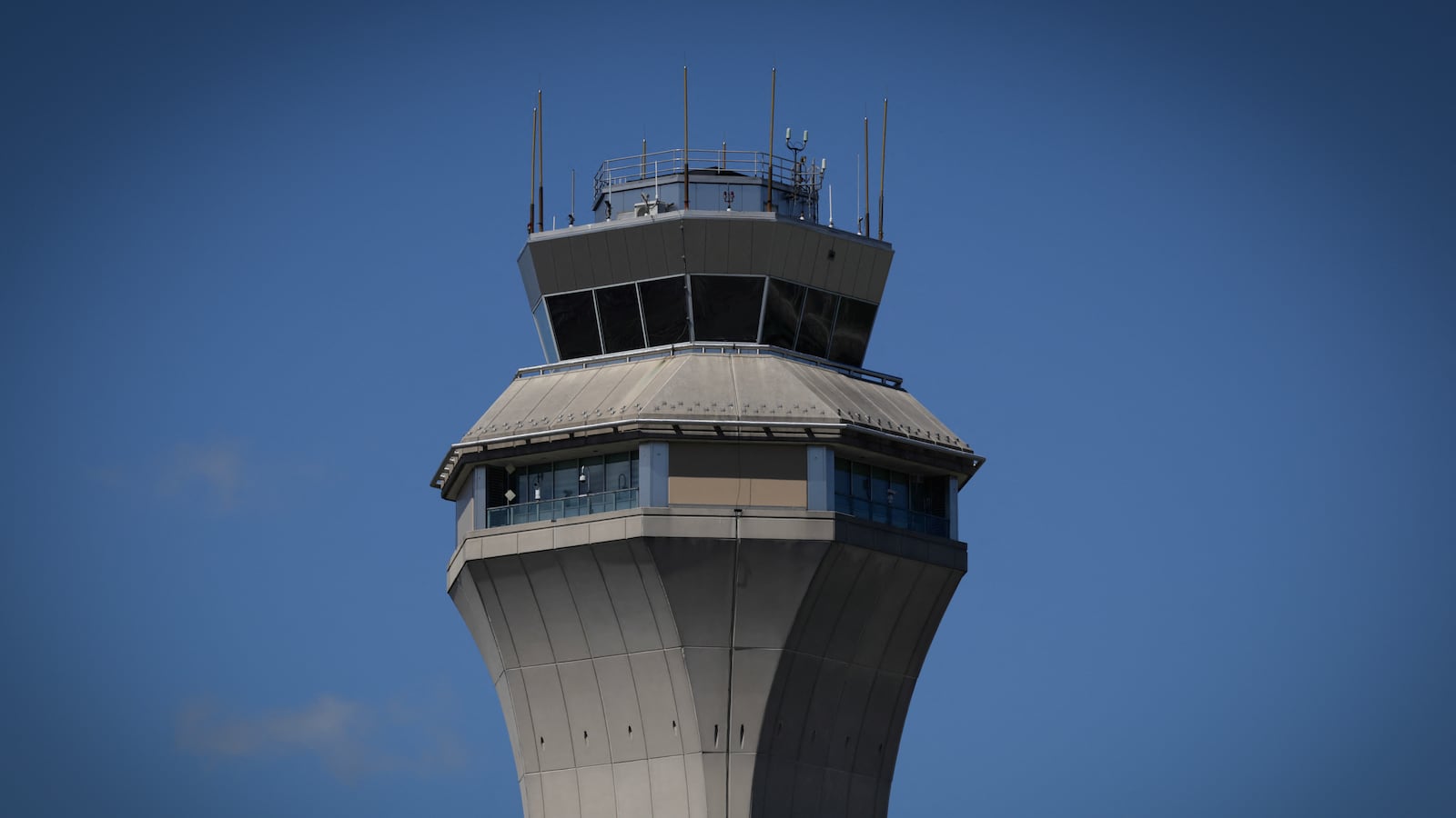 The FAA Air Traffic Control tower at Newark Liberty International Airport in Newark, New Jersey on May 7, 2025. Regulators have been slowing arrivals and departures at one of the United States' busiest airports following a 90-second traffic control system outage last week that has industry experts sounding alarm bells.