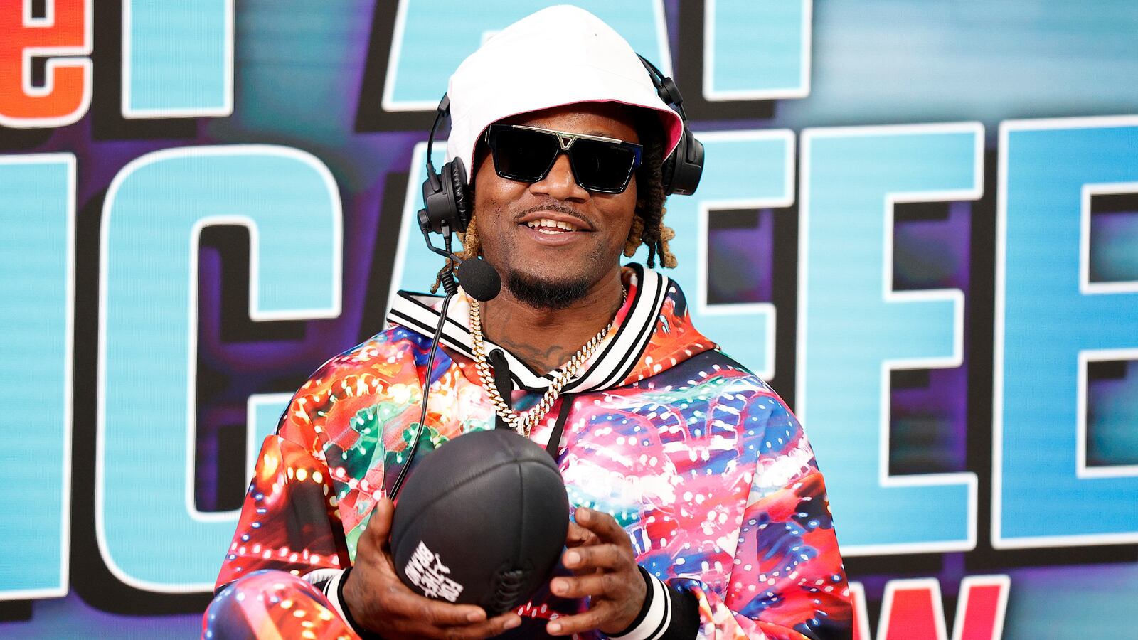 Former NFL player Adam "Pacman" Jones speaks on radio row ahead of Super Bowl LVII at the Phoenix Convention Center on February 9, 2023 in Phoenix, Arizona.