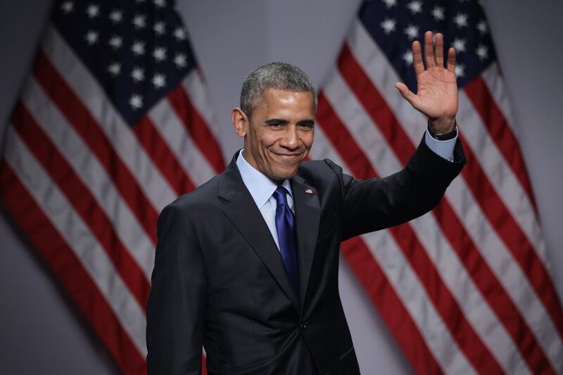President Barack Obama waves after he spoke during a business summit on March 23, 2015 in National Harbor, Maryland.