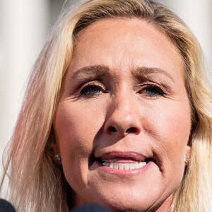 WASHINGTON - MAY 1: Rep. Marjorie Taylor Greene, R-Ga., holds her "Make America Great Again" hat during the news conference outside the U.S. Capitol on Wednesday, May 1, 2024, announcing she will move forward next week on the motion to vacate Speaker Mike Johnson.