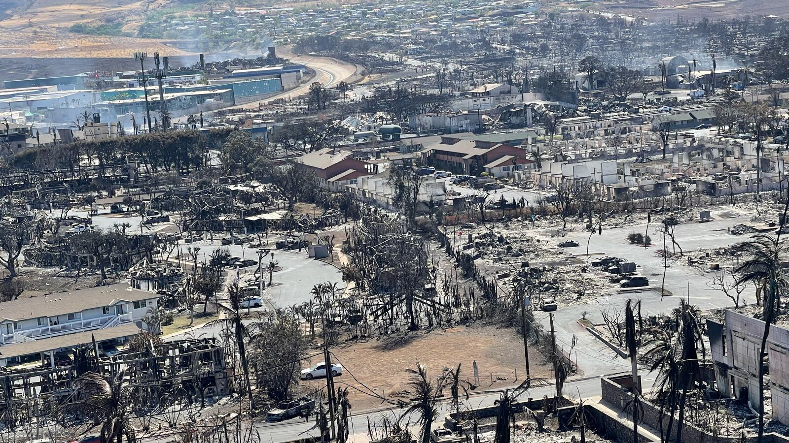 The shells of burned houses and buildings are left after wildfires driven by high winds burned across most of the town in Lahaina, Maui, Hawaii, Aug. 11, 2023.