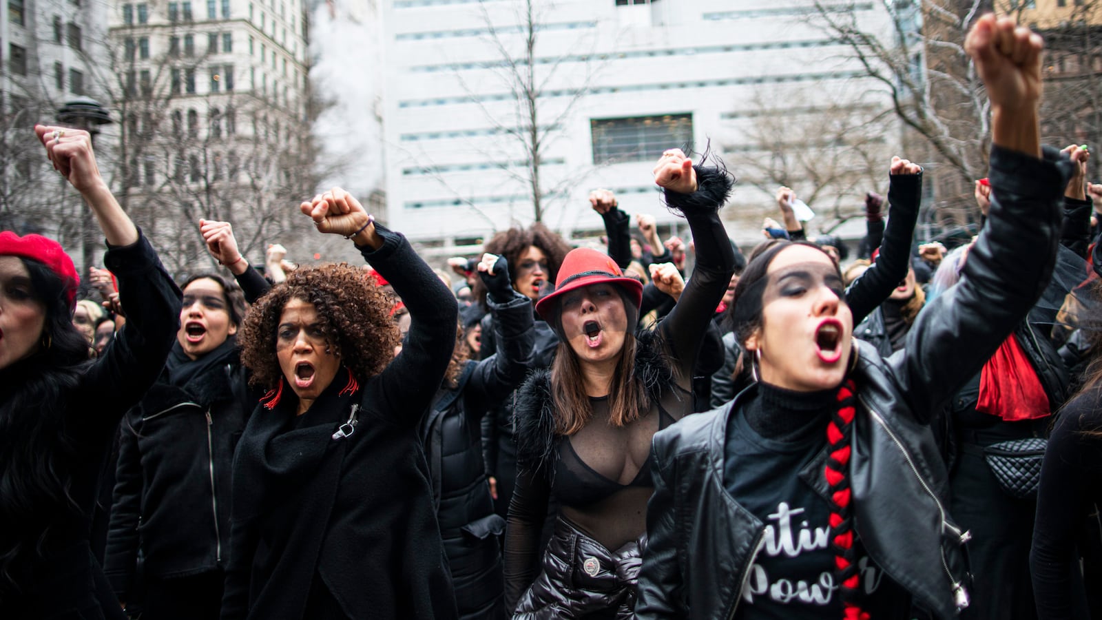 Women protest in front of the court while Harvey Weinstein attends a pretrial session on January 10, 2020 in New York City.