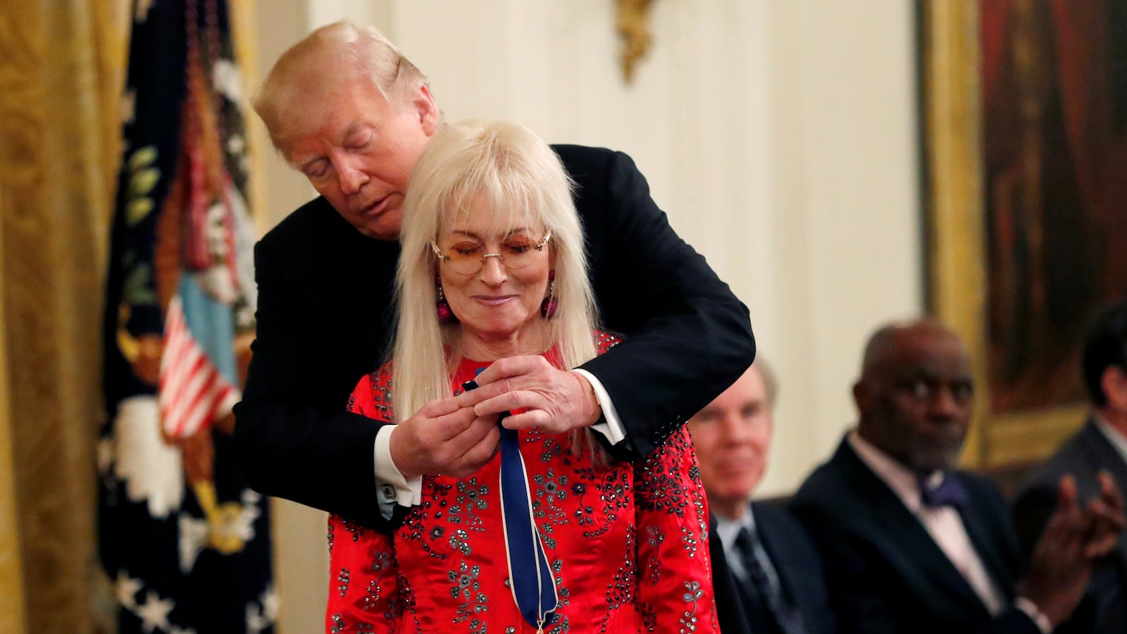 Former President Donald Trump awards the 2018 Presidential Medal of Freedom to Miriam Adelson