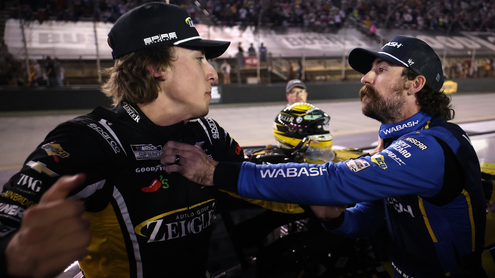 Carson Hocevar, driver of the #77 Zeigler Auto Group Chevrolet, and Ryan Blaney, driver of the #12 WABASH Ford, get into an altercation after the NASCAR Cup Series Bass Pro Shops Night Race at Bristol Motor Speedway on September 19, 2026, in Bristol, Tennessee.
