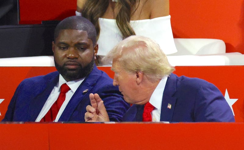 President Donald Trump and Rep. Byron Donalds (FL) sit together during Day 1 of the Republican National Convention (RNC), at the Fiserv Forum in Milwaukee, Wisconsin, U.S., July 15, 2024.