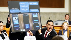 Rep. Robert Garcia (D-CA) displays text messages from Immigration and Customs Enforcement (ICE) agents after Marimar Martinez was shot 5 times, during a public forum on the violent use of force by Department of Homeland Security (DHS) agents, at the Dirksen Senate Office Building on Capitol Hill on February 03, 2026 in Washington, DC. The forum, hosted by Democratic lawmakers, is hearing testimony from Brent and Luke Granger, whose sister Renee Good, was shot and killed by ICE agents in Minneapolis and Marimar Martinez, who survived after being shot by CBP agents in Chicago.