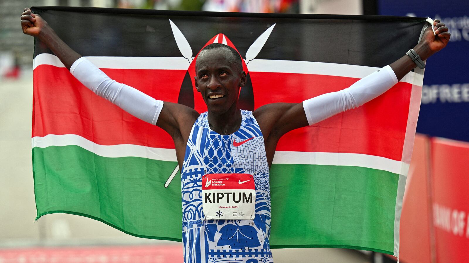 Kelvin Kiptum of Kenya celebrates after setting a new world record time of 2:00:35 at the 2023 Chicago Marathon.