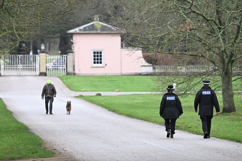 WINDSOR, ENGLAND - FEBRUARY 19: Police Officers patrol near the gates of the Royal Lodge, Andrew Mountbatten-Windsor's former residence in Windsor Great Park, February 19, 2026 in Windsor, England. The former Prince Andrew was arrested today at his new residence on the Sandringham estate on suspicion of misconduct in public office. In a statement, Thames Valley police said they were also "carrying out searches at addresses in Berkshire and Norfolk" as part of the investigation. The Berkshire property is believed to be the Royal Lodge.