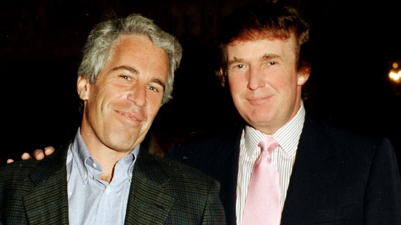 Jeffrey Epstein (left) and Donald Trump as they pose together at the Mar-a-Lago estate, Palm Beach, Florida on February 22, 1997.