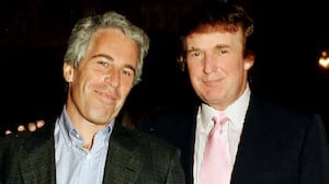 Jeffrey Epstein (left) and Donald Trump as they pose together at the Mar-a-Lago estate, Palm Beach, Florida on February 22, 1997.