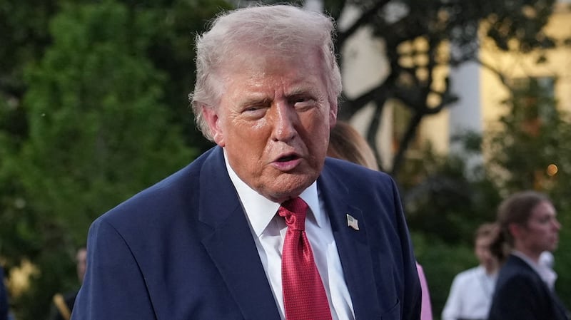 U.S. President Donald Trump looks towards a photographer during the Congressional Picnic at the White House in Washington, D.C., U.S., May 19, 2026.