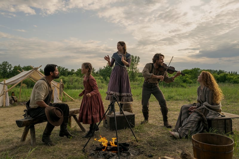 (L-R) Warren Christie as John Edwards, Alice Halsey as Laura Ingalls, Skywalker Hughes as Mary Ingalls, Luke Bracey as Charles Ingalls, and Crosby Fitzgerald as Caroline Ingalls.