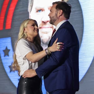 US Vice President JD Vance (R) greets Erika Kirk, Charlie Kirk's widow.