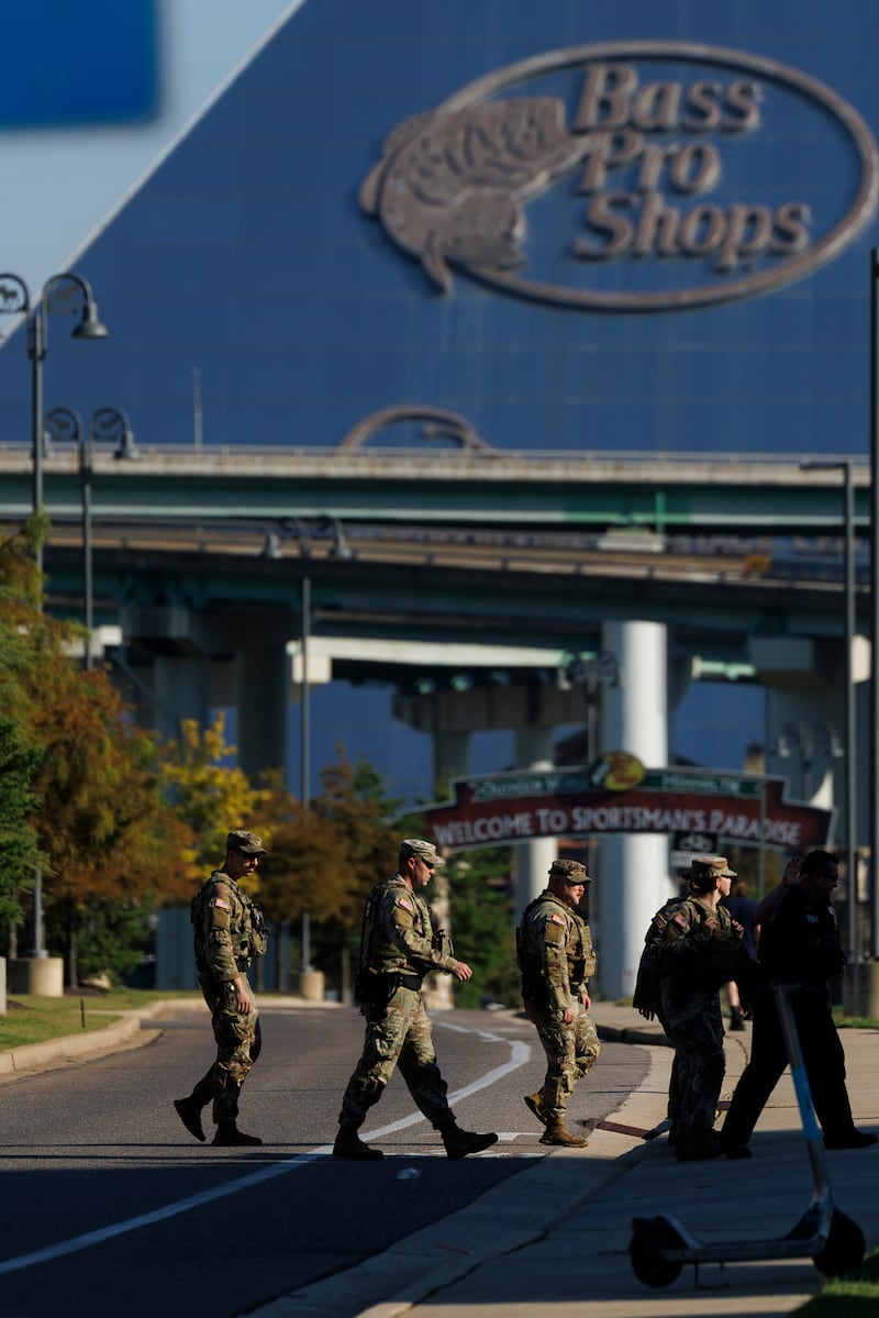 MEMPHIS, TENNESSEE - OCTOBER 11: Members of the National Guard patrol outside Bass Pro Shops on October 11, 2025 in Memphis, Tennessee. National Guard members began patrolling Memphis this week as part of a federal task force established by President Trump to combat what the administration says is violent crime in the city. (Photo by Brett Carlsen/Getty Images)