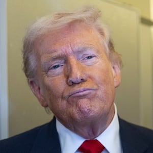 IN FLIGHT- MARCH 7:U.S. President Donald Trump speaks to members of the media traveling on Air Force One while heading to Miami on March 7, 2026. President Trump and other members of the government attended the dignified transfer of six soldiers from the 103rd Sustainment Command who were killed in action by an Iranian drone strike on March 1 in Port of Shuaiba, Kuwait during "Operation Epic Fury". (Photo by Roberto Schmidt/Getty Images)
