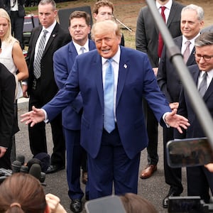 US President Donald Trump, with Meta CEO Mark Zuckerberg and US House Speaker Mike Johnson (R-LA), speaks to the media at the White House driveway following a luncheon for tech leaders in the East Room, in Washington, D.C., US, September 29, 2026.