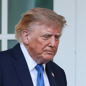 U.S. President Donald Trump walks to attend a dinner in the Rose Garden at the White House in Washington, D.C., U.S., September 2, 2026.