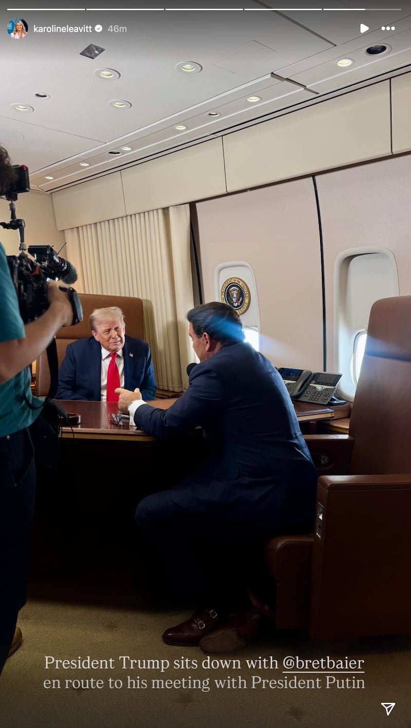 White House Press Secretary Karoline Leavitt shared a photo of President Donald Trump being interviewed by Fox News host Bret Baier on Air Force One as it was en route to Alaska.