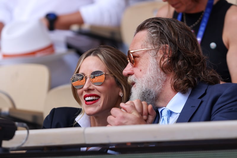 Russell Crowe and  Britney Theriot attend Day One of the 2026 French Open on May 24, 2026 in Paris, France.