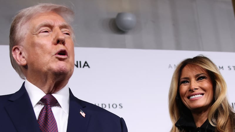 WASHINGTON, DC - JANUARY 29: U.S. President Donald Trump and first lady Melania Trump attend a screening of the documentary film “Melania” at The Kennedy Center on January 29, 2026 in Washington, DC. “Melania” was directed by Brett Ratner, and Amazon paid $40 million to license the film, which follows the first lady in the twenty days before her return to the White House. (Photo by Samuel Corum/Getty Images)