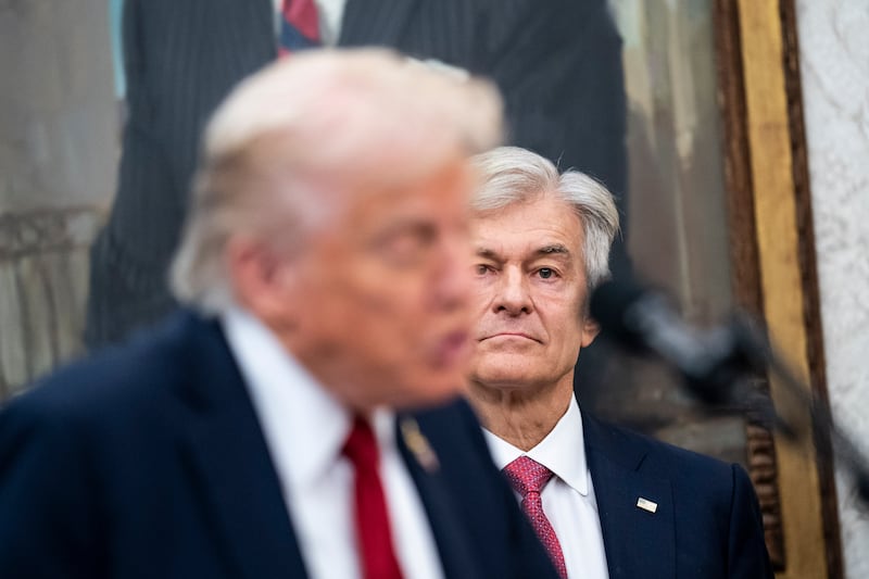 WASHINGTON,DC - SEPTEMBER 30: Centers for Medicare & Medicaid Services Mehmet Oz, speaks with President Donald Trump to announce a deal with Pfizer to lower Medicaid drug prices in the Oval Office at the White House on Tuesday, Sept 30, 2025 in Washington, DC. (Photo by Jabin Botsford/The Washington Post via Getty Images)