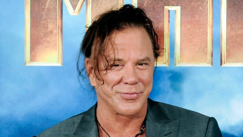 Actor Mickey Rourke poses during a photocall for the movie Iron Man 2 in Los Angeles, California April 23, 2010.