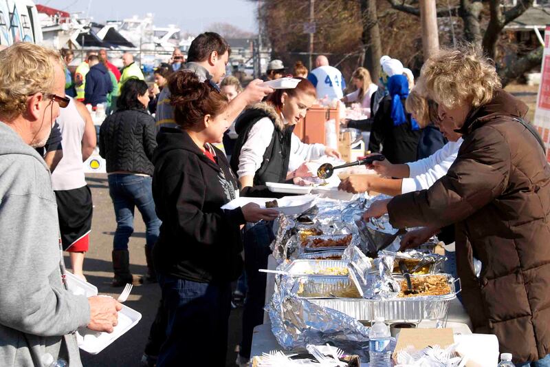 articles/2013/04/29/hurricane-sandy-anniversary-a-reminder-of-the-power-of-volunteers/130428-camp-bulldog-volunteers-iscol-tease_jelzgy