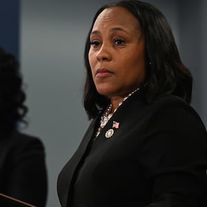 Fulton County District Attorney Fani Willis speaks during a news conference.