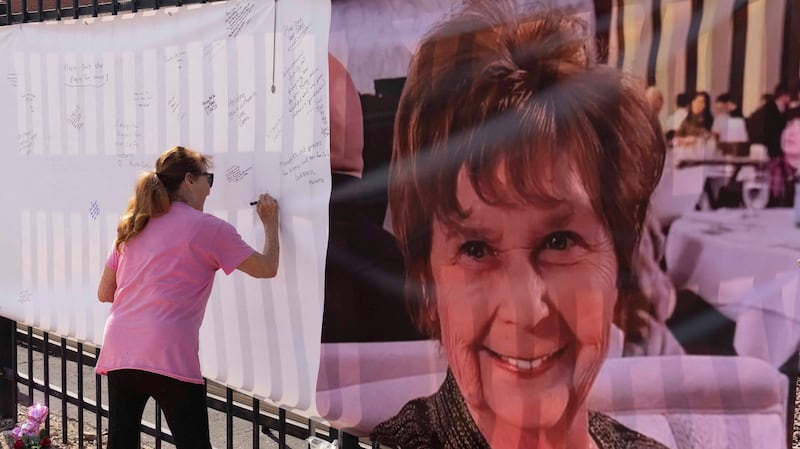 Sign pleads for Nancy guthrie's return.