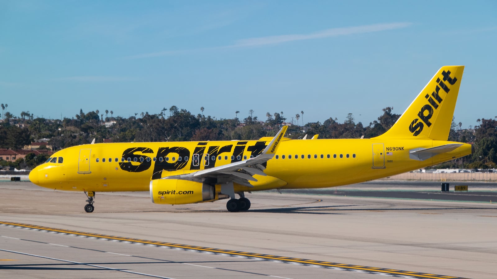 SAN DIEGO, CALIFORNIA - JANUARY 13: A Spirit Airlines Airbus A320-232 taxis at the single runway San Diego International Airport after arriving from Las Vegas on January 13, 2024 in San Diego, California.