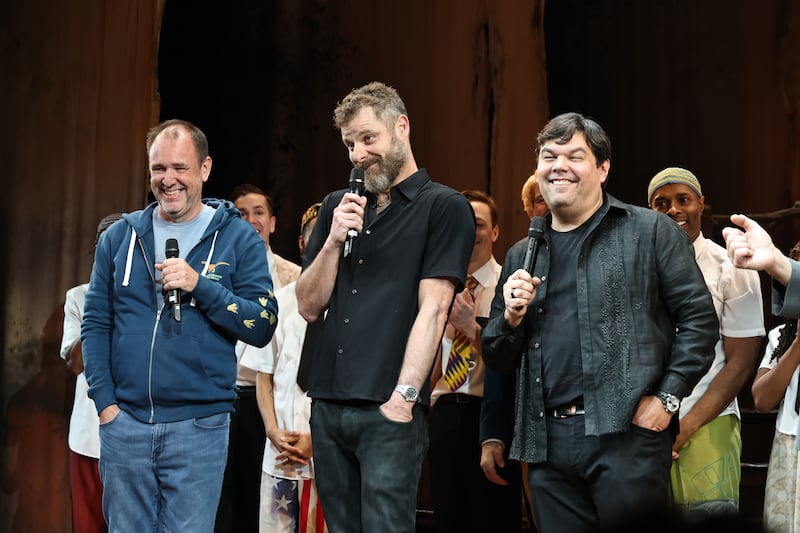 Trey Parker, Matt Stone, and Robert Lopez speak onstage after the special anniversary performance of their musical "The Book of Mormon."