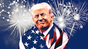 Donald Trump wraps himself in an American flag.