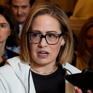 U.S. Senator Kyrsten Sinema (I-AZ) speaks to reporters about ongoing negotiations on a U.S. border security deal at the U.S. Capitol in Washington, U.S., December 20, 2023. REUTERS/Elizabeth Frantz