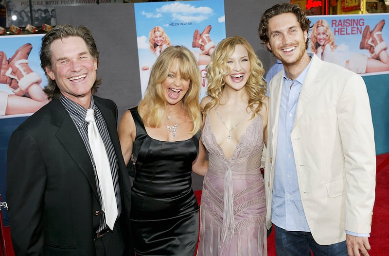 Actor Kurt Russell and his partner, actress Goldie Hawn, and her children, actress Kate Hudson and actor Oliver Hudson
